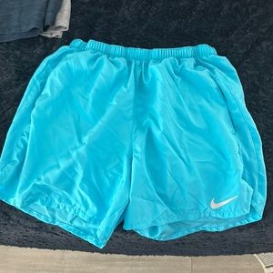 Never worn lined men’s Nike running shorts 5”